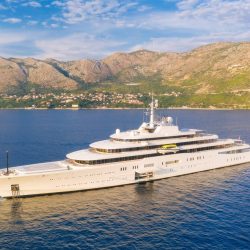 luxury-yacht-and-blue-sea-at-sunset-in-summer-aerial-view-1.jpg